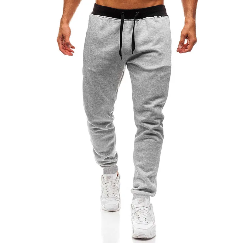 2024 moda uomo palestre pantaloni di colore puro pantaloni da jogging Fitness pantaloni lunghi Casual da uomo pantaloni sportivi Skinny da