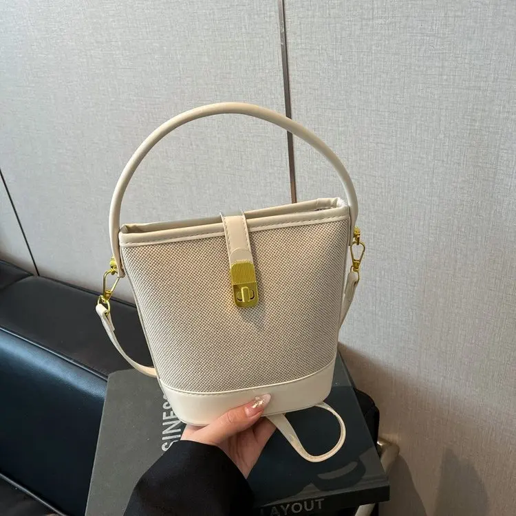 

2026 New French Retro Niche High-end Versatile Portable Bucket Bag Trendy Splicing Shoulder Messenger Bag