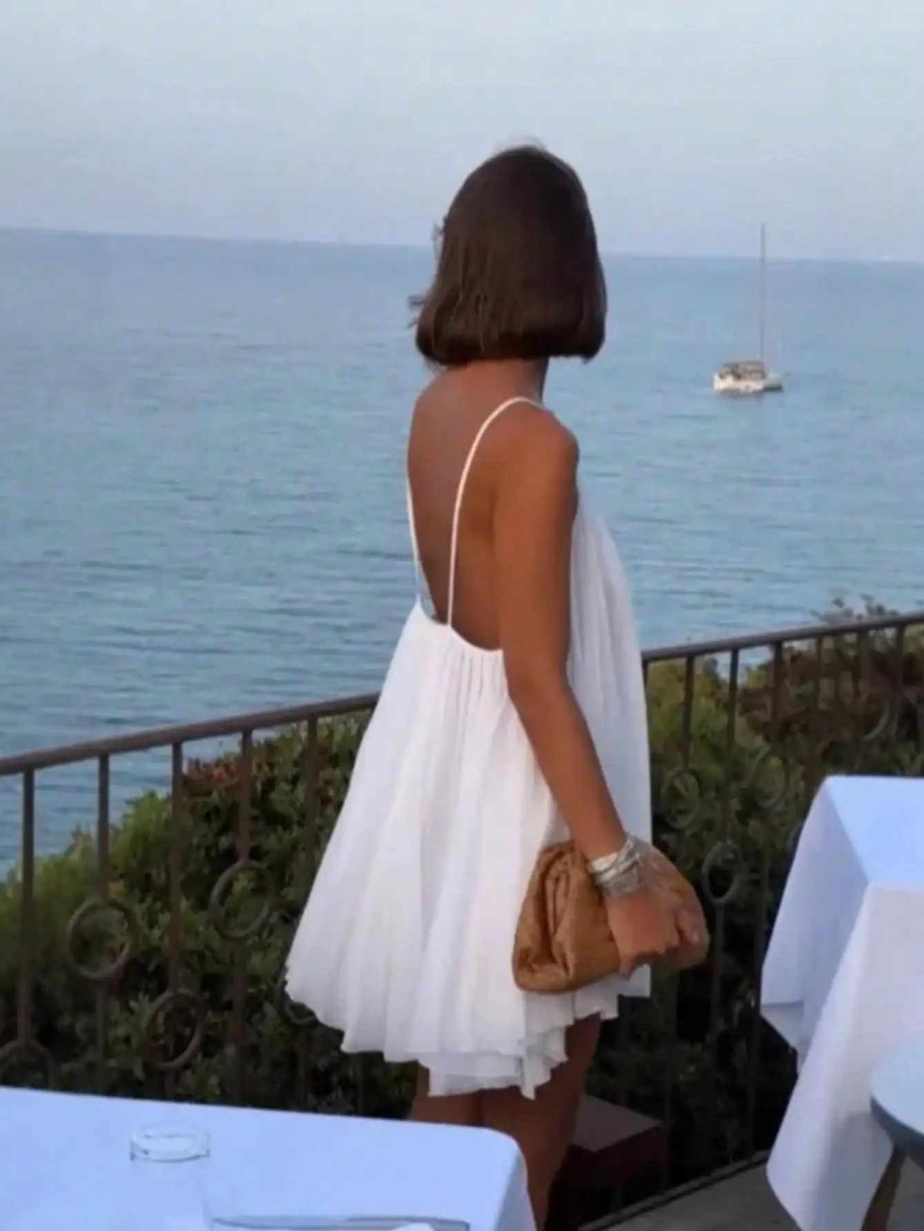 

Women's White Backless Sleeveless Dress with Pleated Hem for Beach Vacation