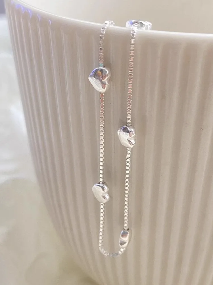 

S925 pure silver heart-shaped bracelet, with a sweet style. It is a perfect choice for ladies' exquisite jewelry.