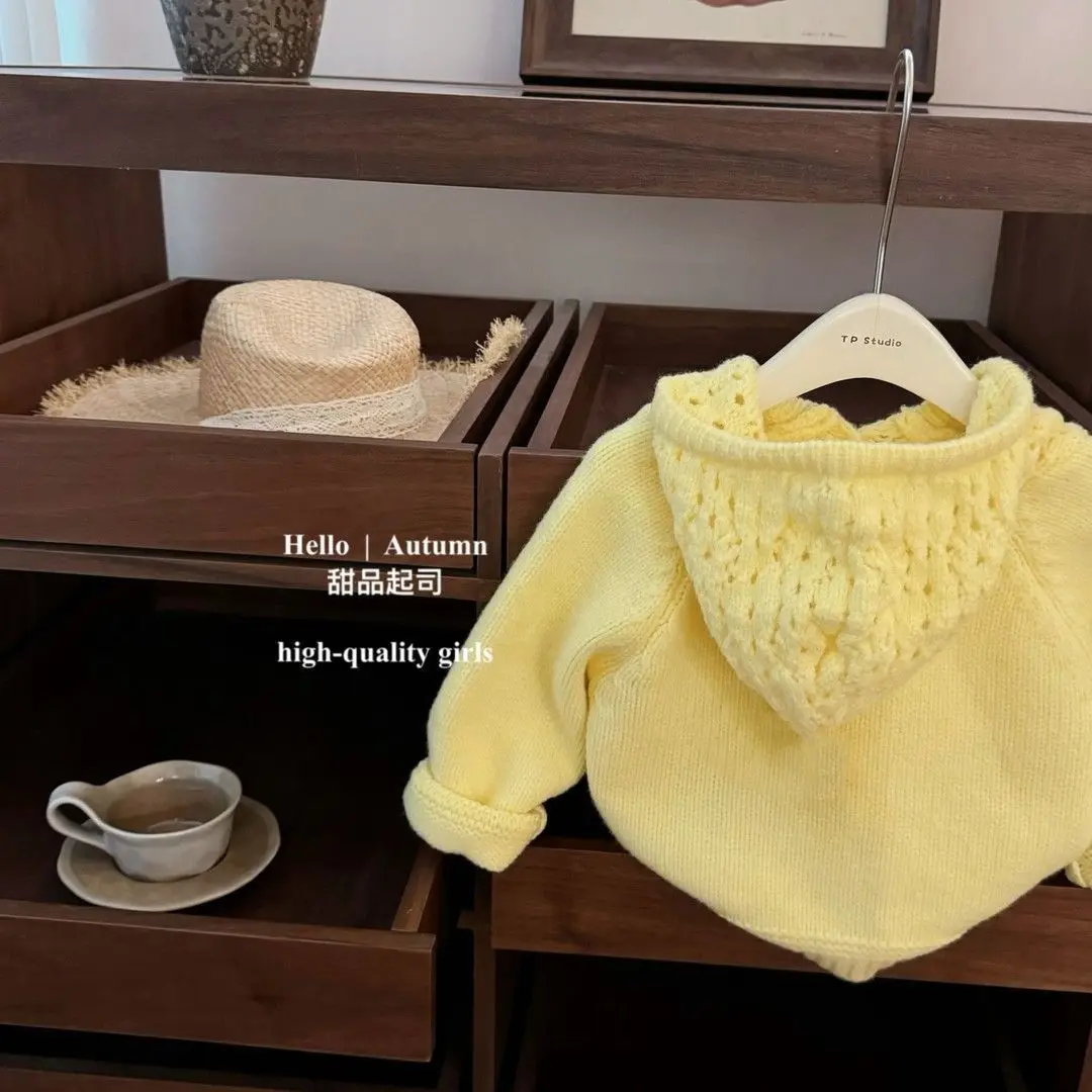 Baby girl hooded hollow knitted sweater autumn and winter new style children's stylish yellow top