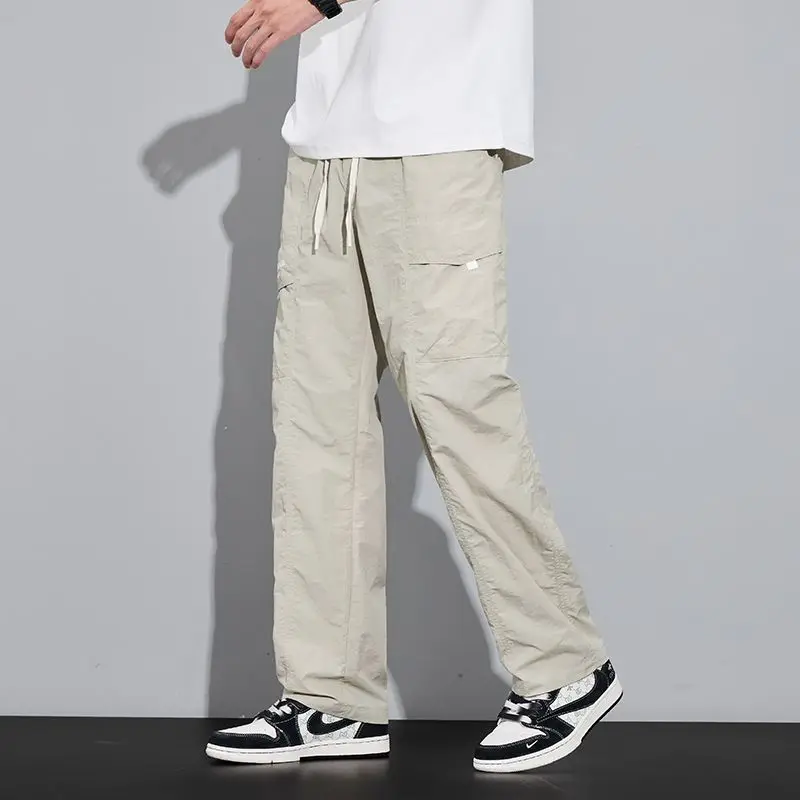 ربيع جديد نمط الرباط واسعة الساق جيب النايلون عارضة السراويل للرجال