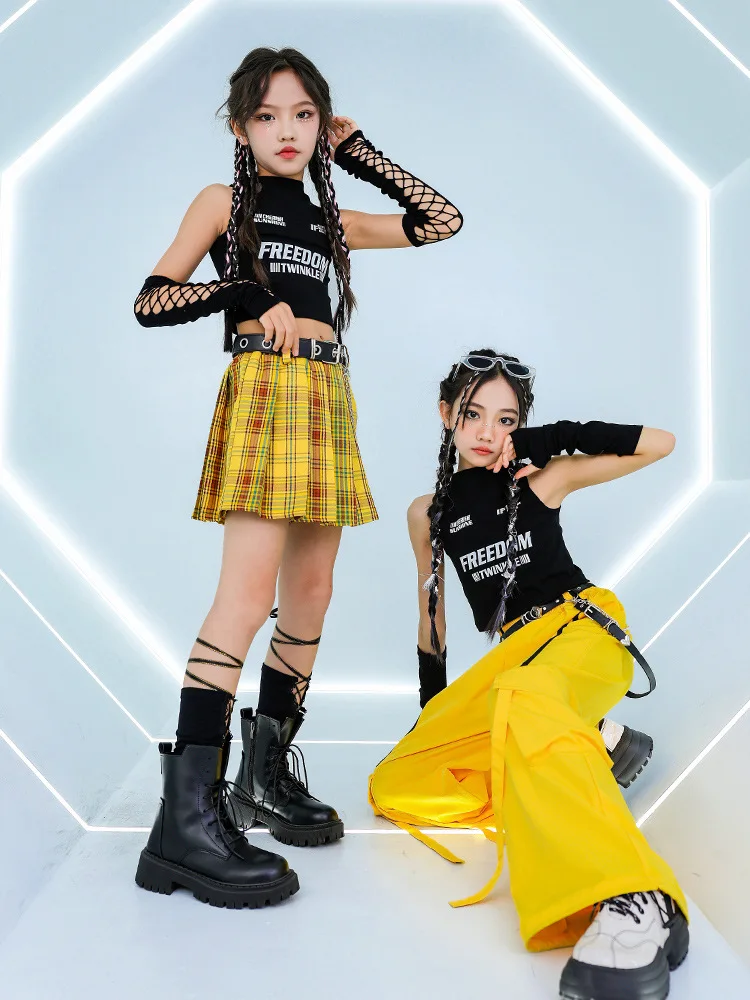 Mädchen Street Dance Kleidung Schwarze Weste Gelbe Hose Karierter Rock Cheerleading Performance Kostüm Kpop Hip Hop Bühnenoutfits