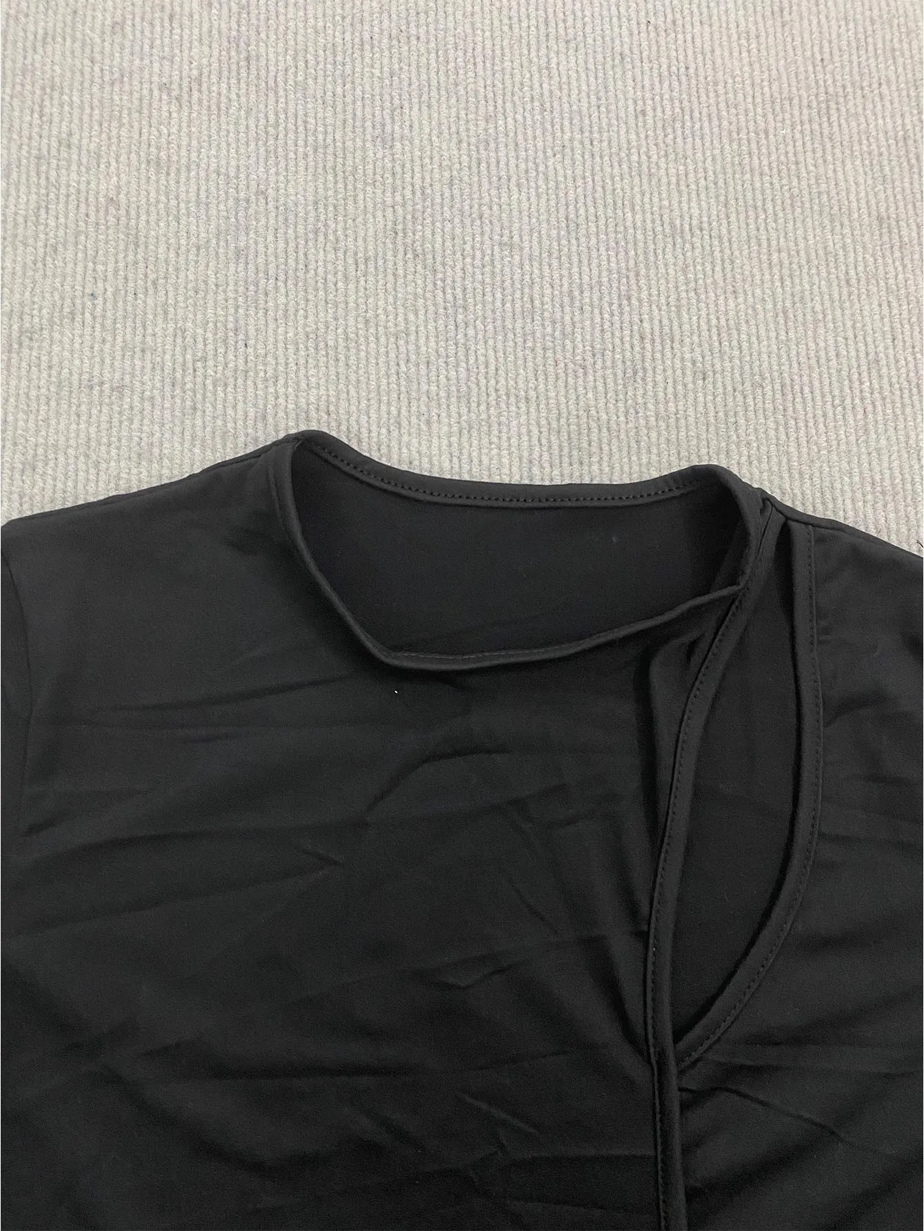 

Women's Casual Daily Streetwear Black Embellished Asymmetrical Neck Cut Out Waist Short Sleeve Fitted Bodysuit 2026