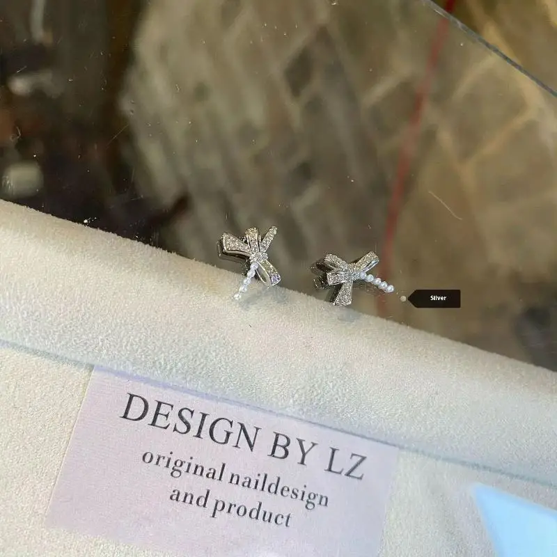 Lujosa decoración de uñas de circón, lazo de perlas de plata 3d, joyería en forma de mariposa, abalorio artístico para uñas, suministros de diseños de manicura Diy