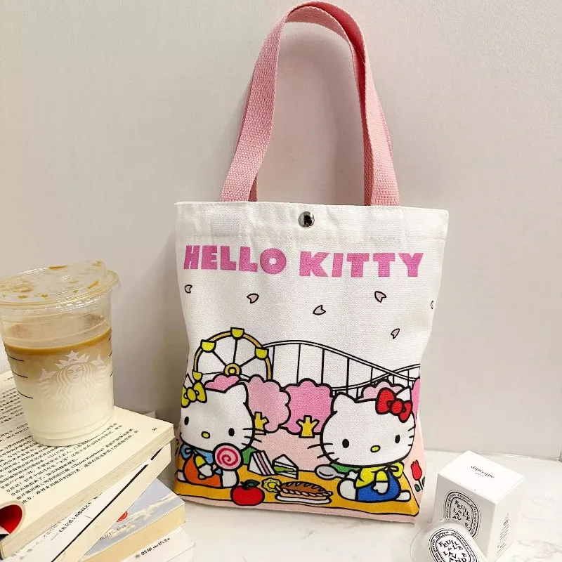

Hello Kitty One Shoulder Tote Bag with Button Cute Cartoon New High Beauty Large Capacity Commuting Canvas Bag Gift Wholesale