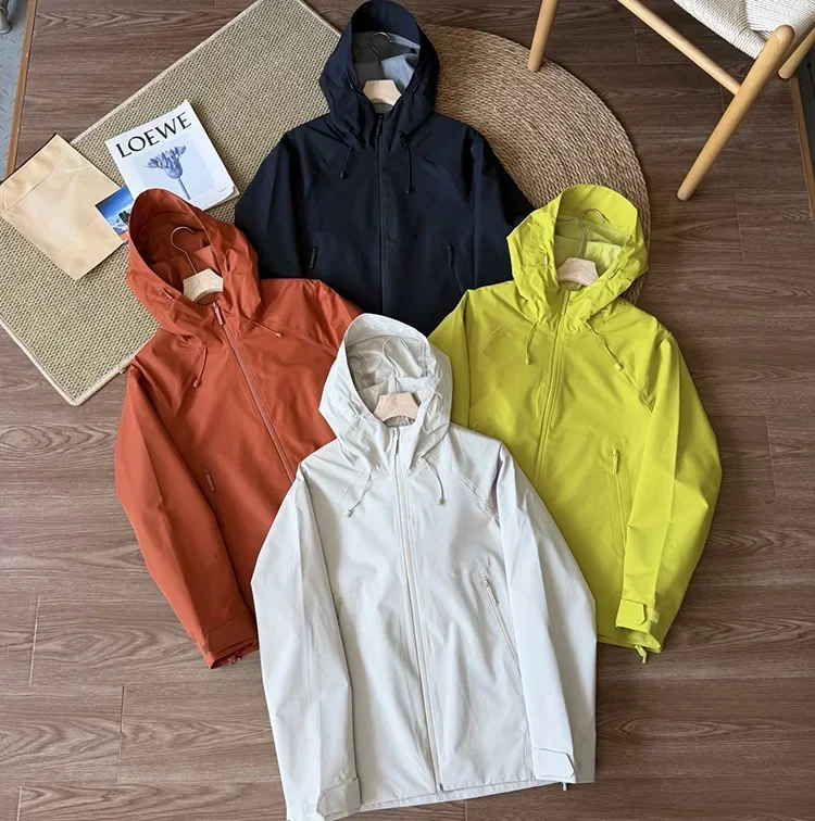 Unisex Windbreaker-Jacke mit Kapuze in Unifarbe – Leichte Reißverschluss-Oberbekleidung für Herbstfahrten und Outdoor-Aktivitäten – Detail 2