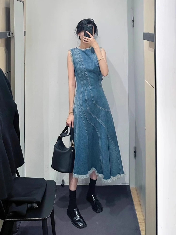 กระโปรงยีนส์สีน้ำเงินสไตล์วินเทจ แต่งผ้าปะติดปะต่อ ทรงเอวสูง ช่วยพรางหุ่น สไตล์เกาหลี เหมาะสำหรับใส่ไปเที่ยวทะเลหรือไปทำงาน  ฤดูใบไม้ผลิ 2025