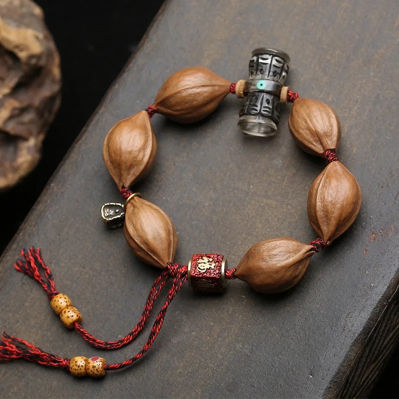 

Natural original olive pit carving hand bead Tibetan style carving material Buddha pendant sandalwood meet Bodhi accessories