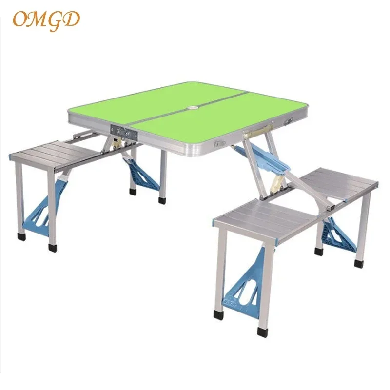 OMGD Outdoor Folding Table Aluminium Alloy One-piece Portable Stall Promotional Camping Barbecue Table And Chairs Set News