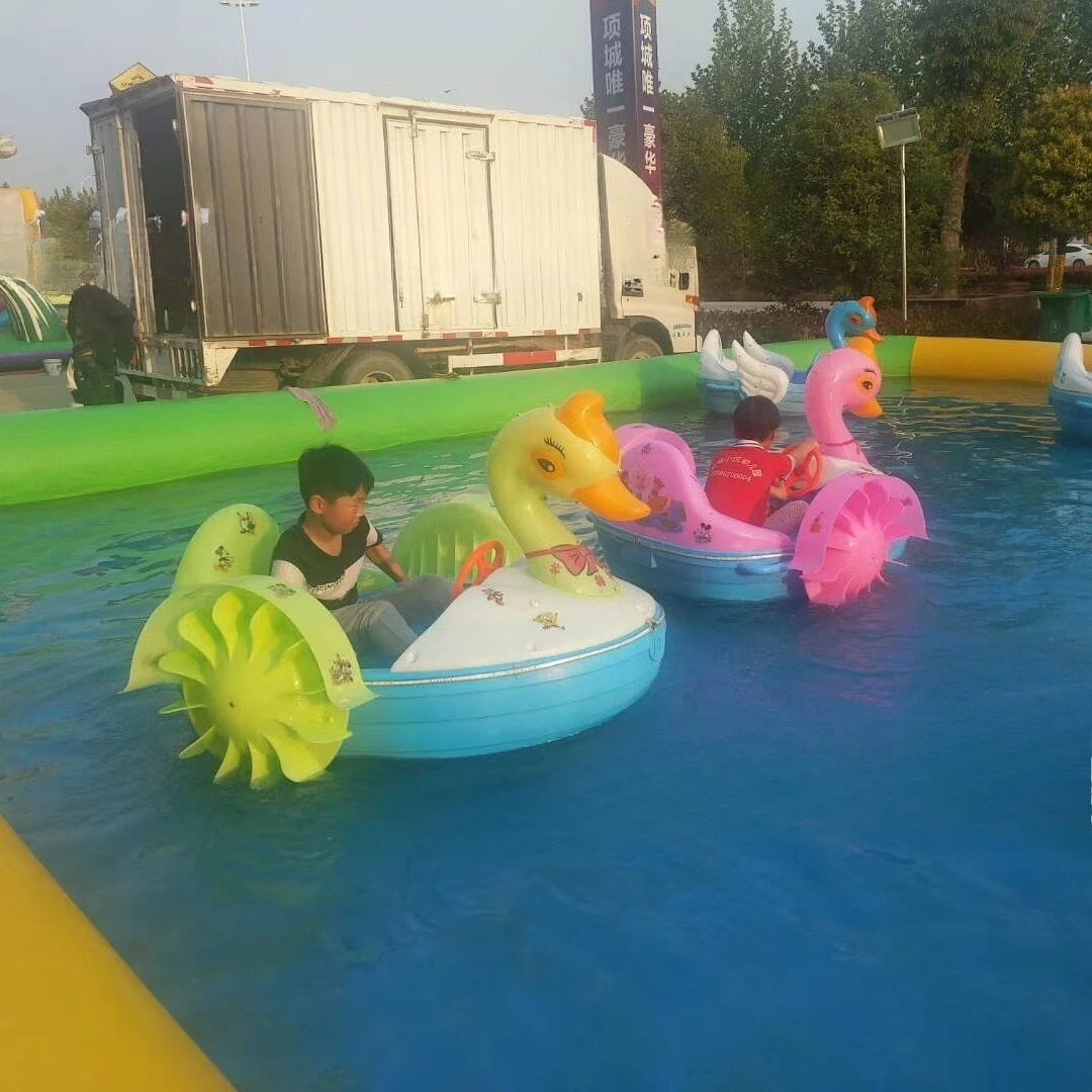 Lighting and music cartoon parent-child hand-cranked electric boat children's water play remote control timing rocking boat