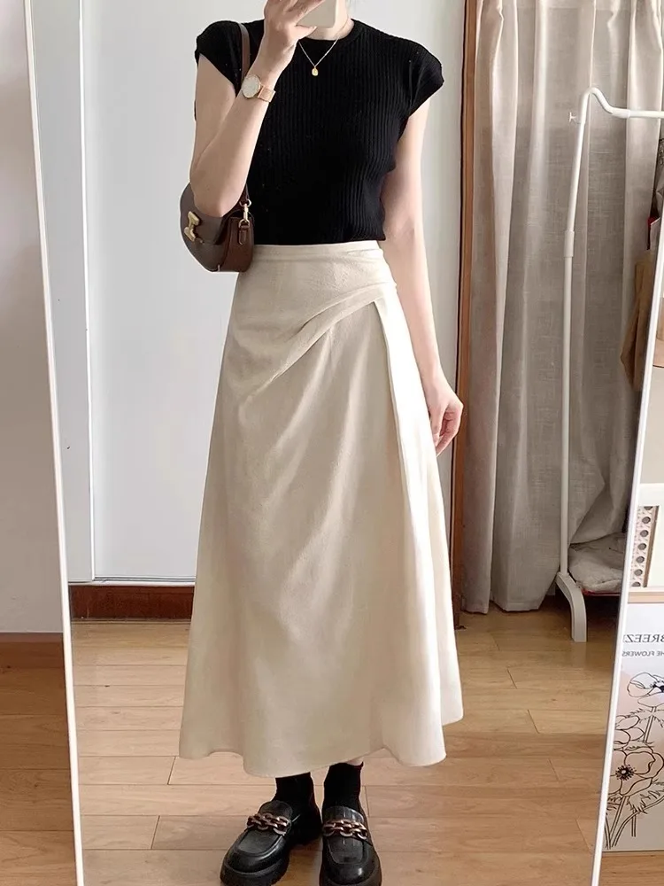Aprikosenfarbener High-Waist A-Linien-Midirock für Damen, Sommer 2026, dünner, unregelmäßiger, hüftbedeckender Schirmrock, modischer Pack-Hip-Stil – Detail 8