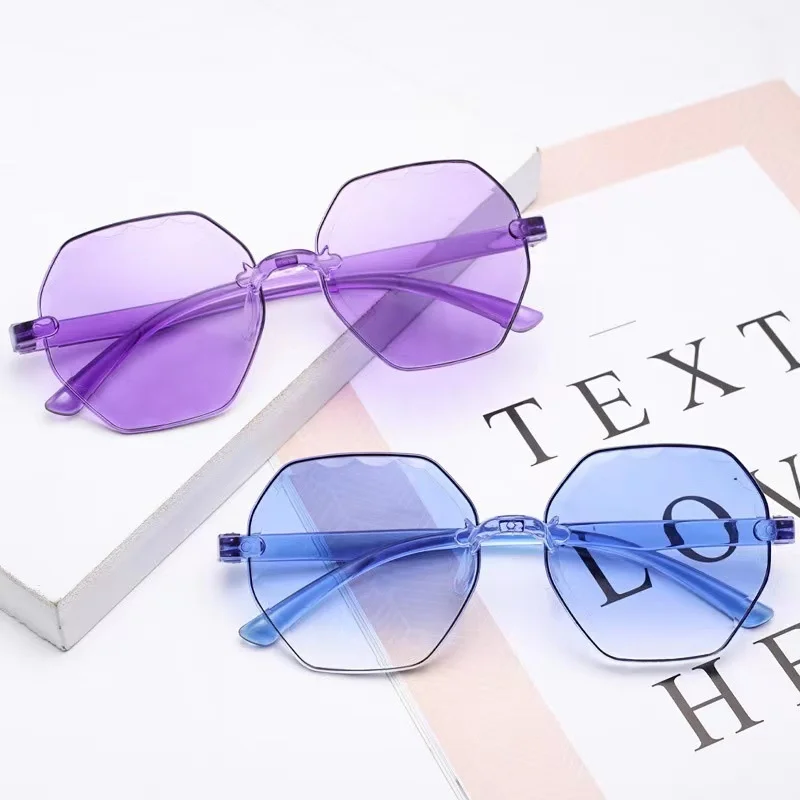 New frameless multilateral Sunglasses one piece jelly candy color female Sunglasses irregular color glasses