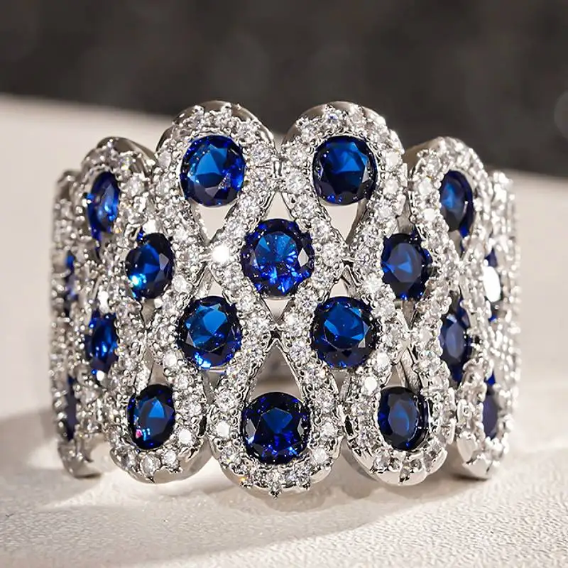 Huitan Zarte Ringe, Accessoires für Damen, Party, Alltag, Verlobung, Luxus-Modeschmuck, eingelegt, glänzender blauer Zirkonia