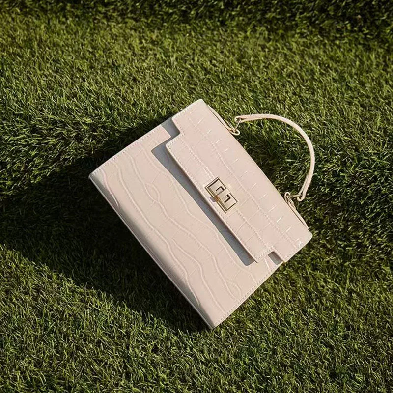 2026 popular new fashion versatile patent leather handbag solid color metal buckle decoration shoulder crossbody bag