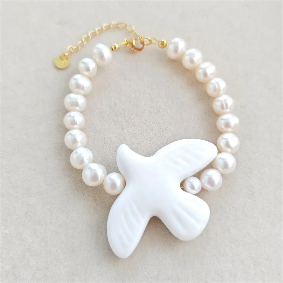 

Official-website Ceramic Peace Dove Pendant Pearl Bracelet for Women/girl Gift Love Peace Hope for Europe New Trendy Jewelry