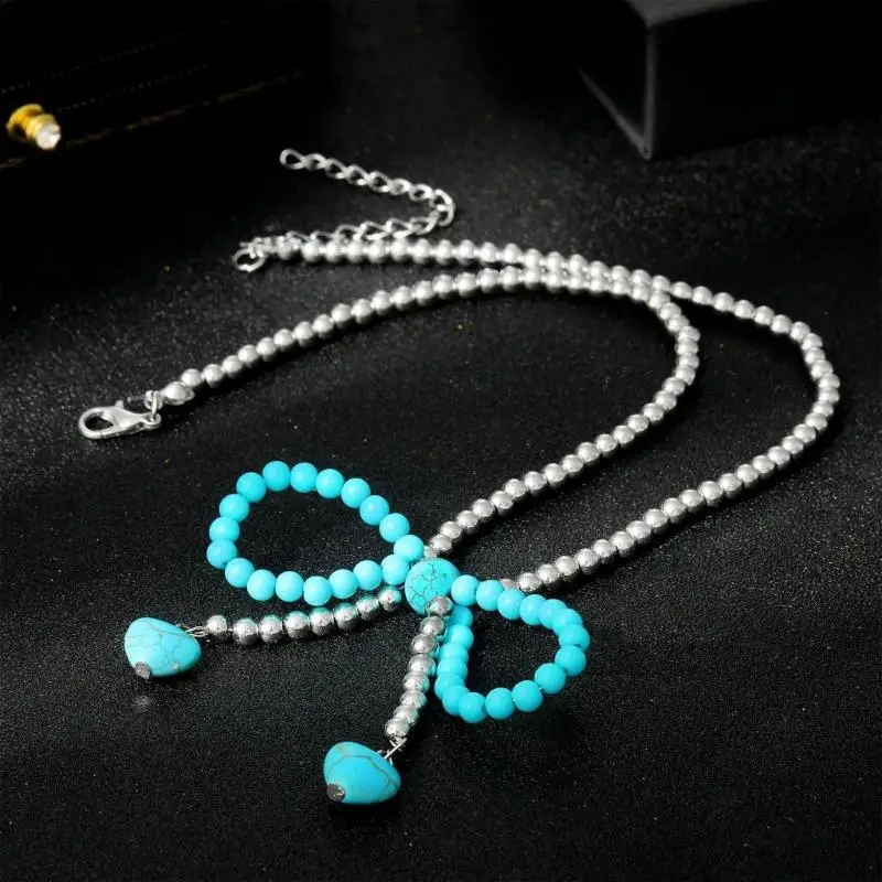 قلادة سلسلة ذوي الياقات الرجعية الكلاسيكية مزين بتصميم قلب القوس وحجر الفيروز للتفصيل يوميًا #3