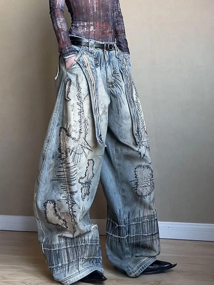 Amerikaanse retro gewassen denim jeans met noodlijdend en bedrukt ontwerp, losse en wijde pijpen streetwear broek voor dames