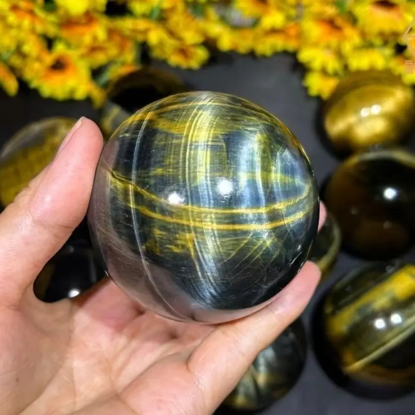 Natural Crystal Ball with Cat'S Eye Effect in Blue And Yellow Tiger Eye Stone, Featuring Blue And Yellow Patterns Feng Shui
