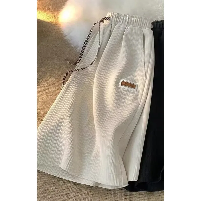 Summer thin shorts men's new casual loose breathable hanging feeling student five quarter pants embroidered logo straight leg ca