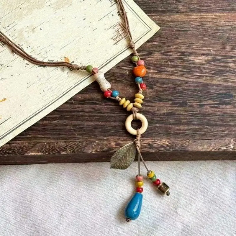 Neue Halskette im chinesischen Stil mit Keramikperlenanhänger für Damen, runde Blattform, lange Pulloverkette, ästhetischer Schmuck, Geschenk – Detail 6