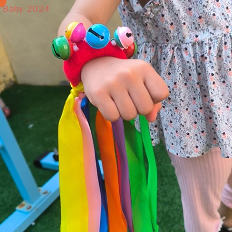 دعامة رقص على شكل زهرة يدوية، جرس دائري قوس قزح، خشخيشة يدوية لأجواء فريق التشجيع والألعاب