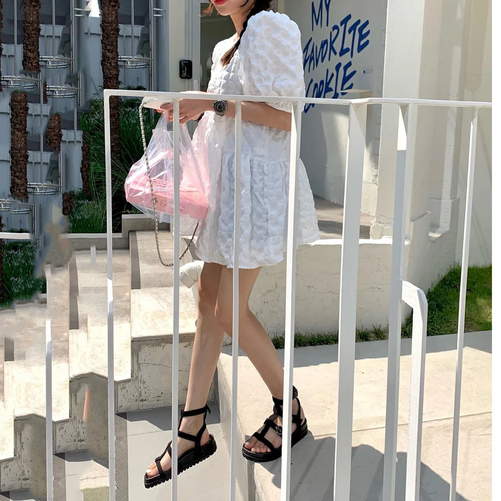 فستان نسائي صيفي جديد بتصميم كوري، بياقة دائرية ولون سادة، بقصة A-Line وأكمام قصيرة، بتصميم منفوش ومريح. #1