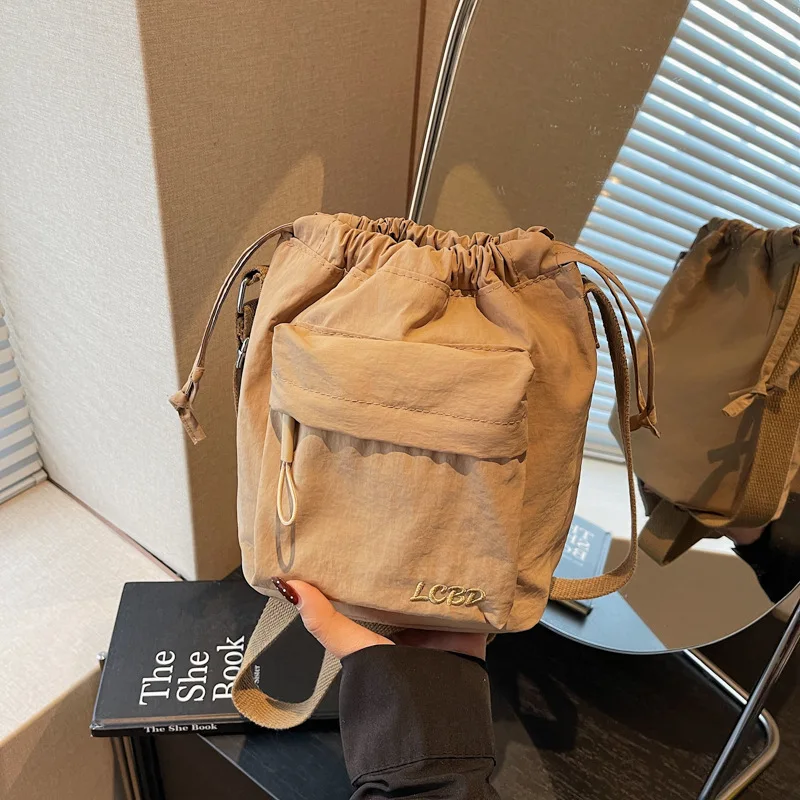 

Нейлоновая сумка через плечо, однотонная, с завязками, в форме ведра, повседневная, простая, легкая, универсальная, модная сумка-мессенджер.