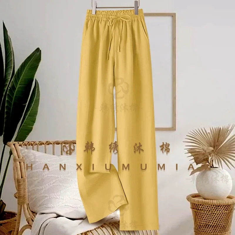 بنطلون صيفي جديد فضفاض وواسع الساق بلون سادة من القطن والكتان مع خصر مطاطي ورباط للسيدات