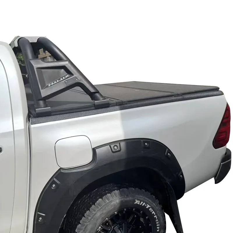 

From 2006 to 2024 the Aluminum Three-fold Cover Hard Panel Lid for the Trunk of the 5ft Hilux Revo Pickup Truck