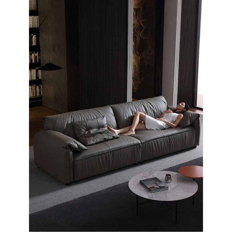 

Italian minimalist elephant ear leather sofa light luxury three-seater in-line large apartment top-layer cowhide living room fur