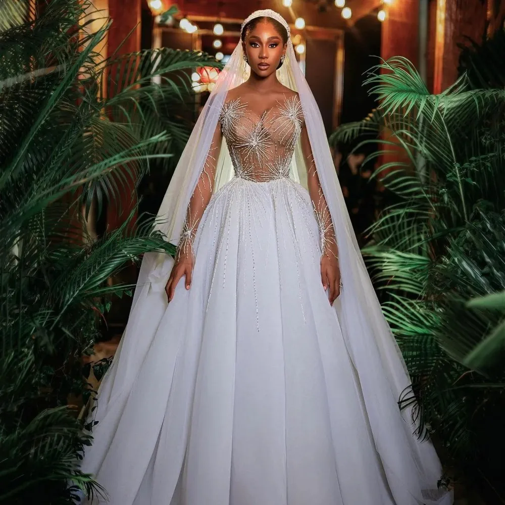 Stunning White Fireworks Lace Wedding Dresses See Thru Full Sleeves A-line African Beaded Wedding Gowns Pretty Bridal Dress