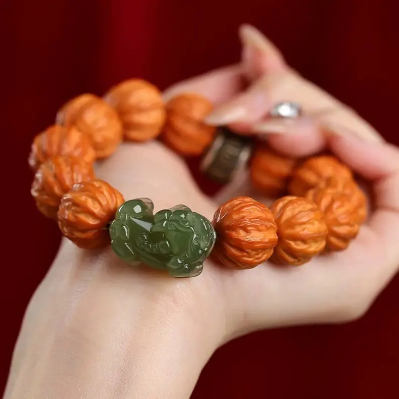 

Hericium erinaceus string Beijing eight-edged walnut string pumpkin pile Hetian jade lucky brave Buddha beads Wen play