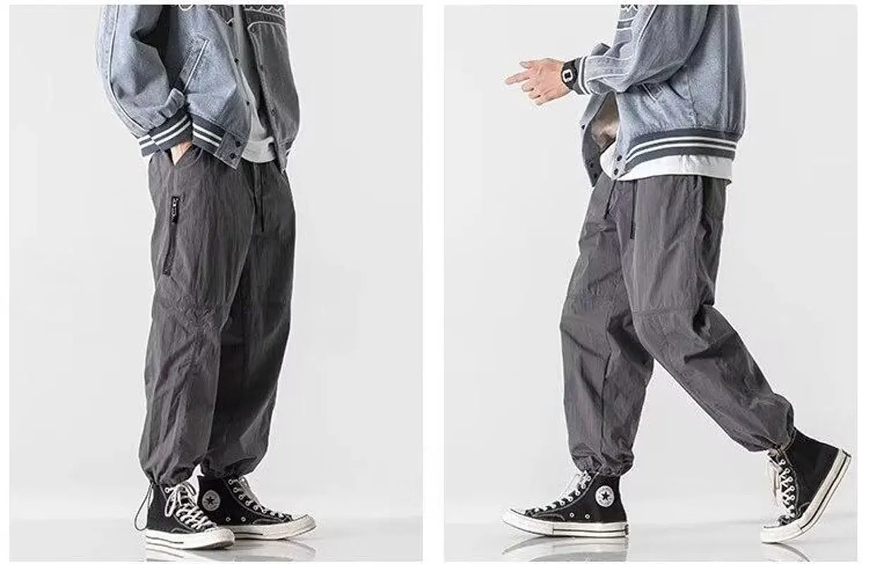 Everyday trend Outdoor sports Zipper pocket loose conical cargo drawstring leg casual pants for men