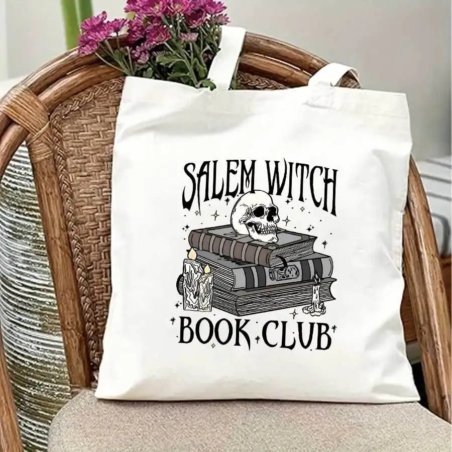 Salem Witch Book Club Canvas Tote Bag, Spooky Skull Magic Book Shoulder Bag, Reusable Shopping Handbag for Halloween Party Gift