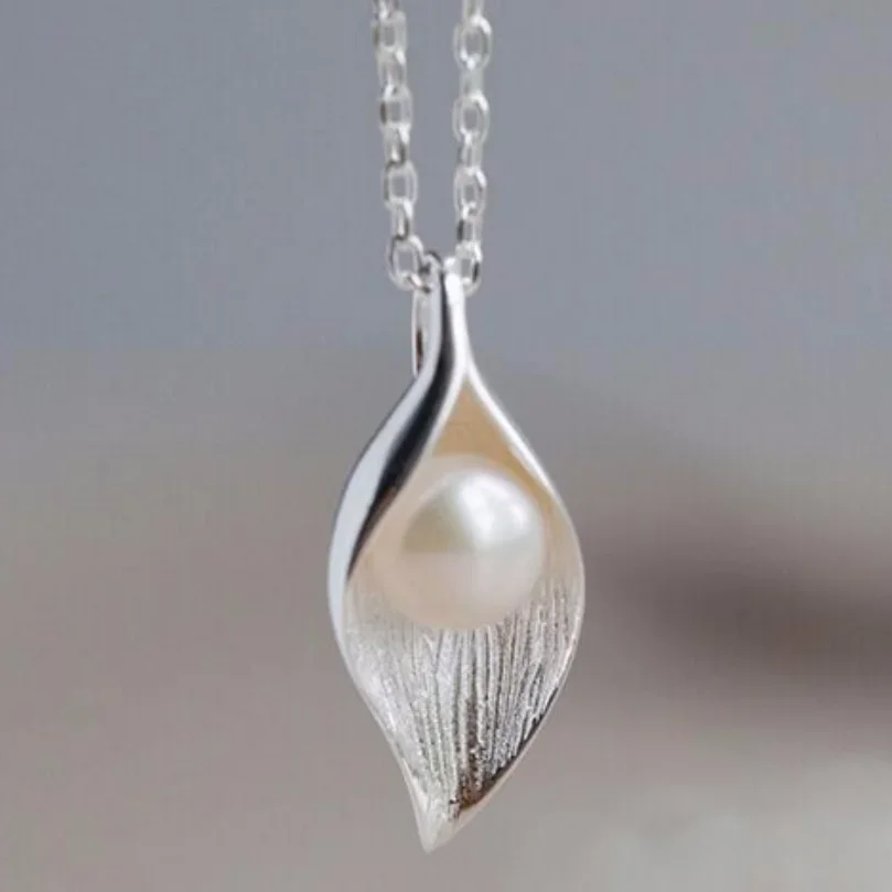 

Очаровательный кулон из белого жемчуга Южного моря диаметром 10 мм