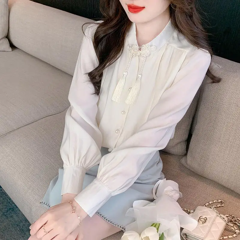 

New Chinese style button down solid color chiffon shirt women's spring 2026 new elegant long sleeved design sense loose top