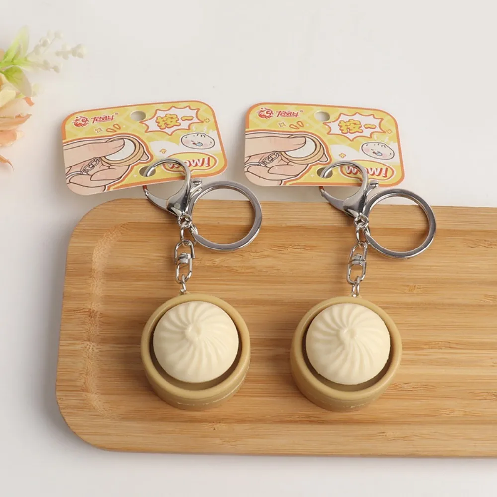 Jouet anti-stress en forme de bouton Baozi, outil magique pour soulager le stress, style porte-clés portable, relaxant pour le corps et l'esprit