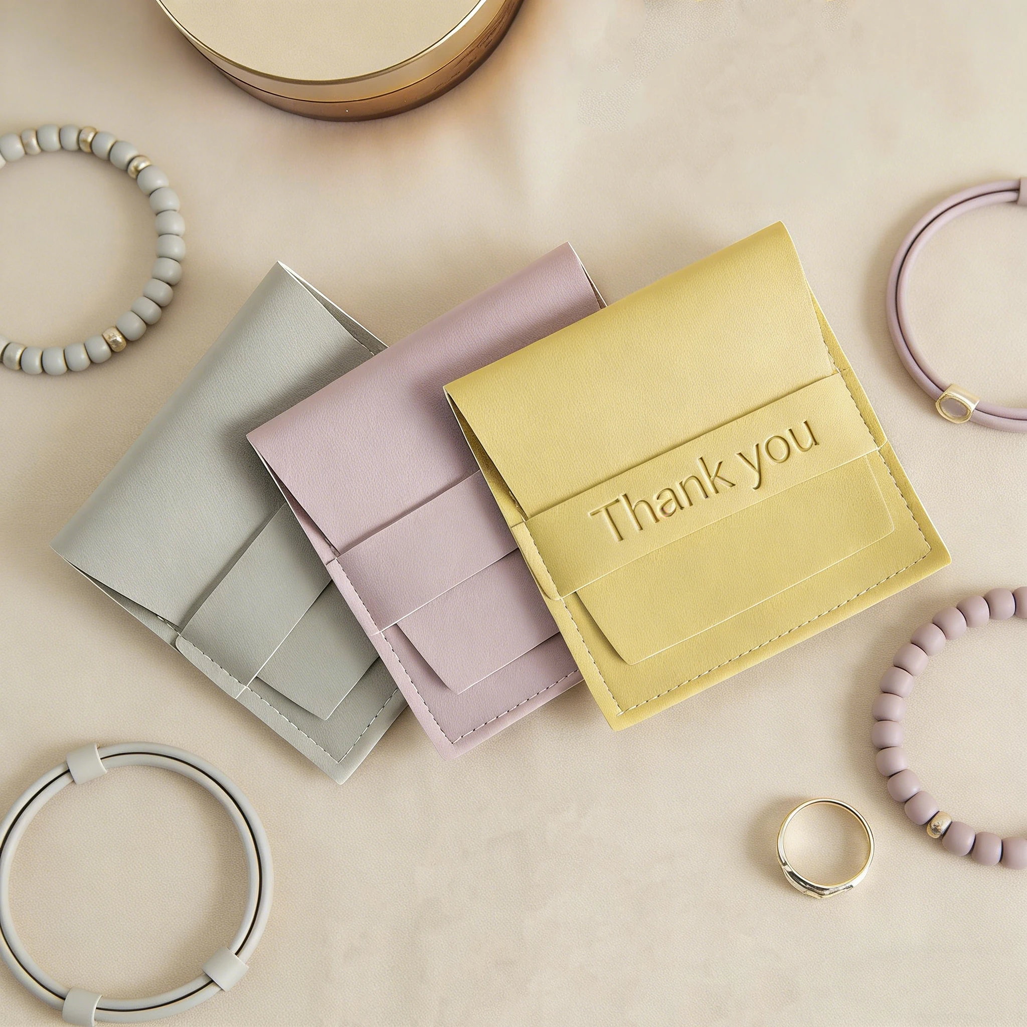 50-100pcs-8x8cm-pu-leather-jewelry-bags-custom-logo-ring-earrings-packaging-flap-pouches-for-bracelet-necklace-envelope-gift
