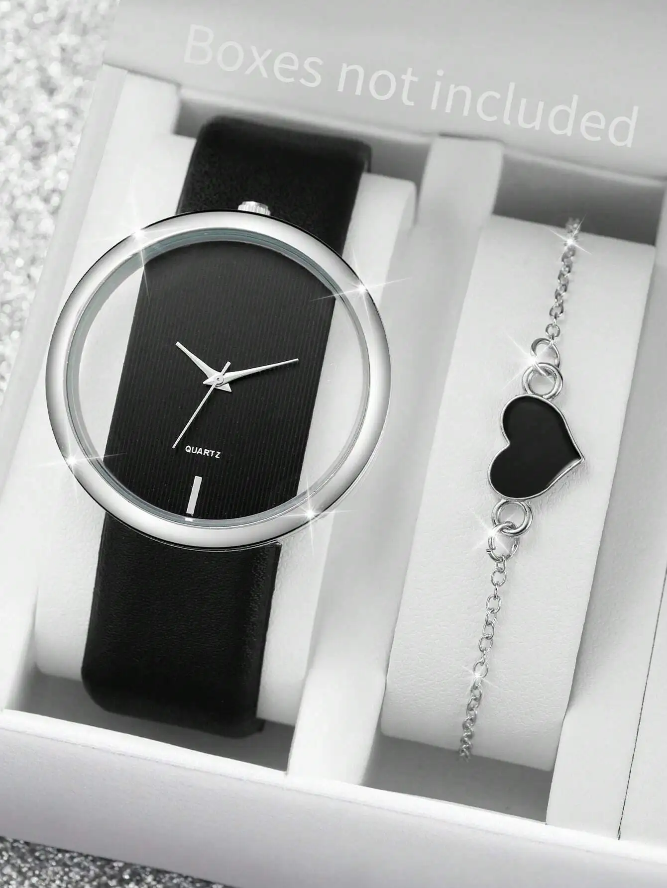 

Набор из 2 предметов: минималистичные кварцевые часы с черным циферблатом и кожаным ремешком + браслет-цепочка с подвеской в виде сердца