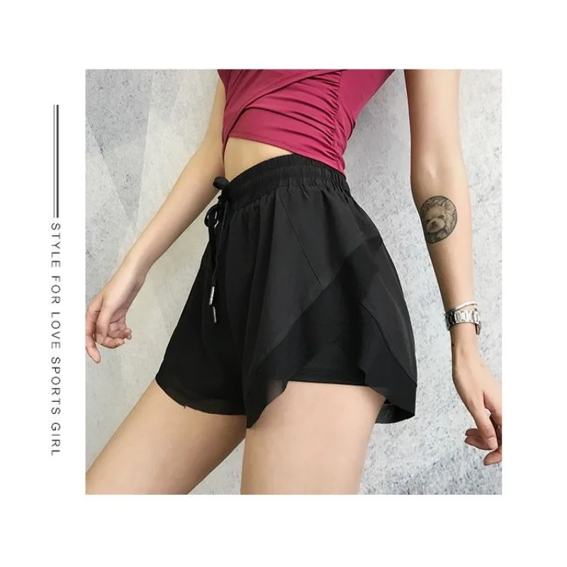 Shorts esportivos femininos de verão, calças soltas de ioga casuais discretas com cobertura de carne