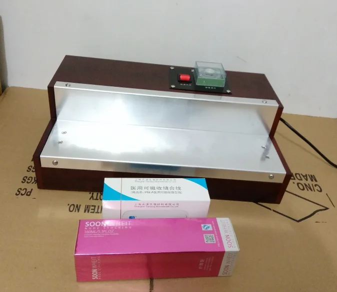 

Маленькая оберточная машина с ручным столом