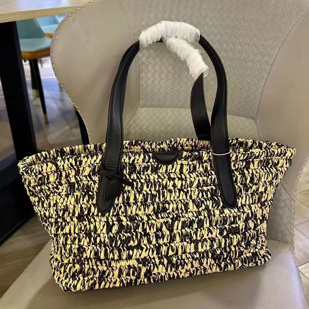 

Lafite Grass Hand-woven Tote Bag 2026 New Fashion Leather Woven Straw Armpit Bag Texture Unique Fashion Simple Casual Daily