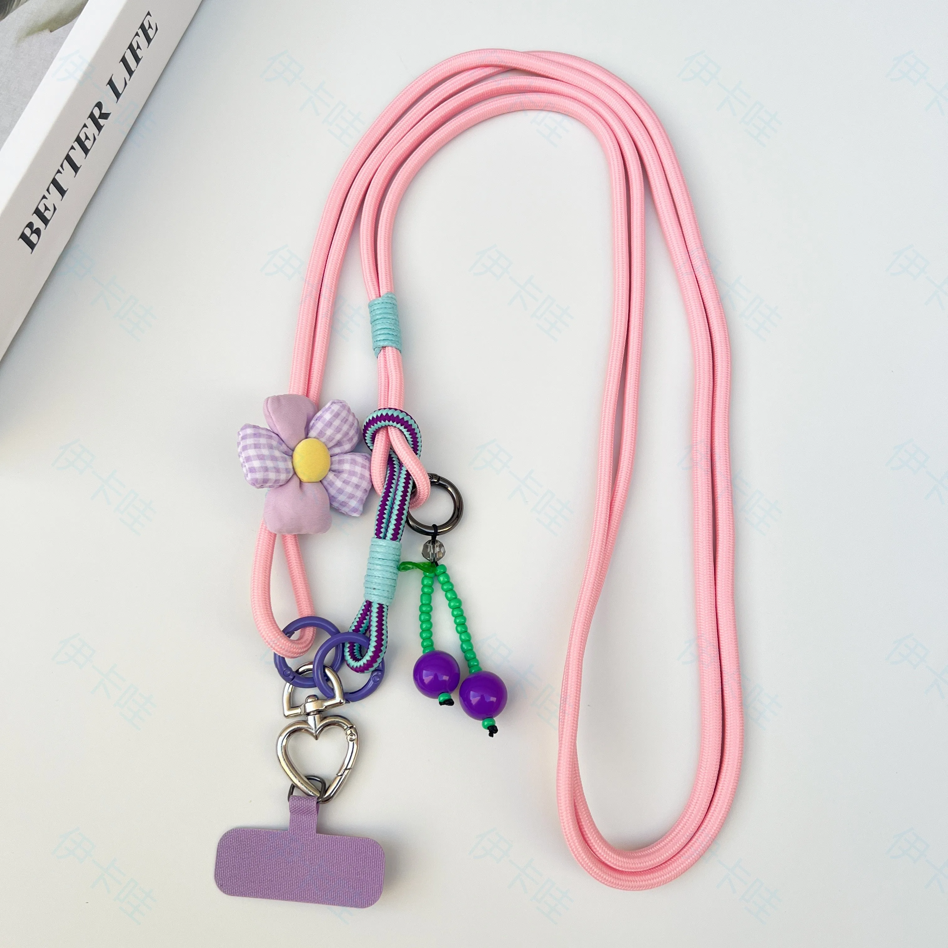 Cordão multifuncional dois em um para celular com uma longa corda inclinada e pingente de flor em forma de coração giratório