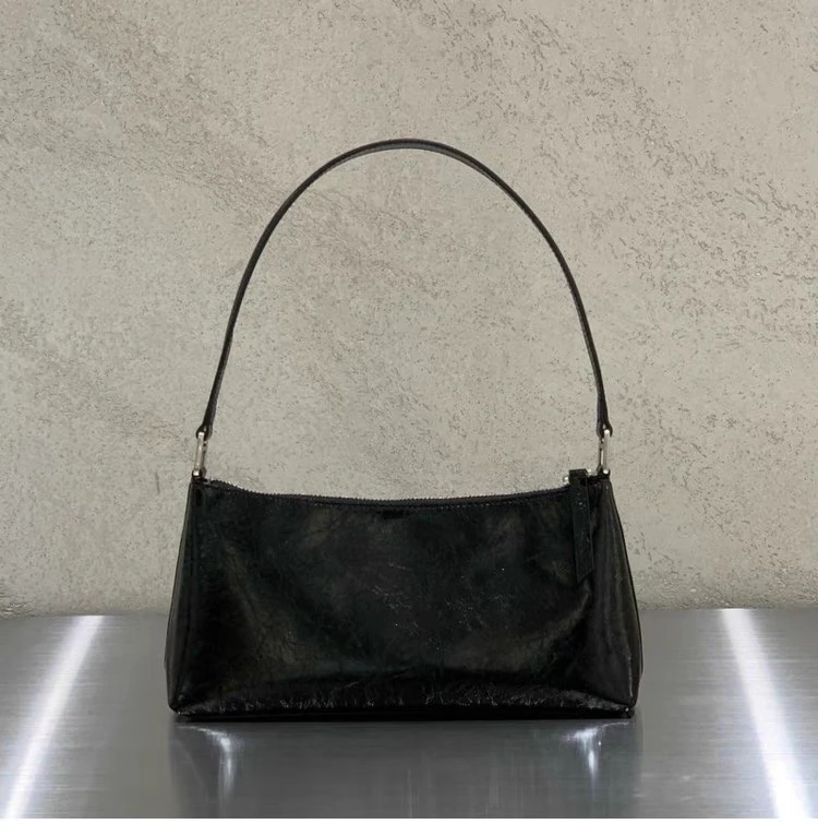 حقيبة يد نسائية ماركة Dearni Dongda Gate 2023 من جلد البقر المطوي اللامع حقيبة تحت الإبط كورية Sle لون نقي