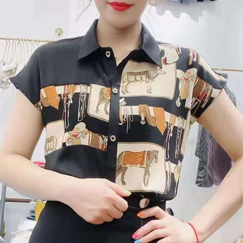 Mode revers bouton ample imprimé chemise asymétrique vêtements pour femmes 2025 été nouveaux hauts décontractés en mousseline de soie bureau dame Blouse