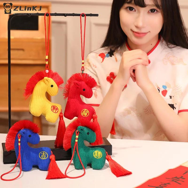 

▶1PCS 12cm 2026 Year Of The Horse Mascot Plush Toy Pendant Soft Realistic New Born Gifts Pony Doll Home Decoration Ornament