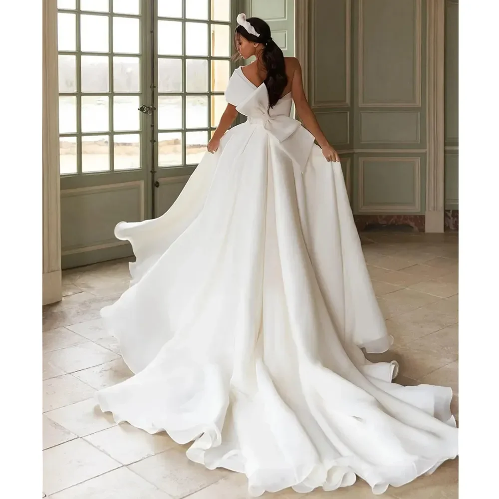 Customize White Bohemian Slit wedding gown A-line skirt Lace applique single shoulder sleeveless bridal gown with large bow