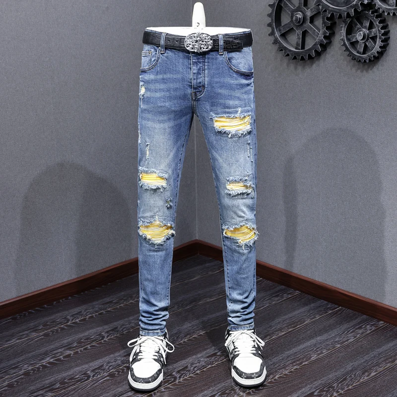 European and American street fashion men's jeans retro washed blue elastic tight tear jeans men's yellow leather patch designer