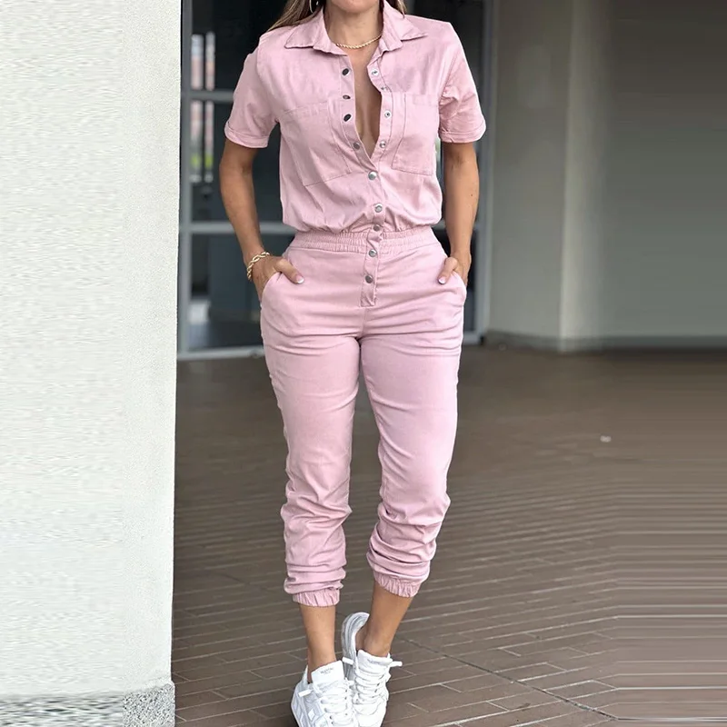 Elegante playsuits met revers en korte mouwen Chique elastische rompertjes met meerdere zakken High Street Fashion Effen jumpsuits met enkele rij knopen